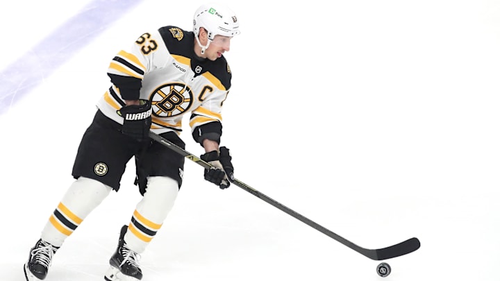 Mar 1, 2025; Pittsburgh, Pennsylvania, USA;  Boston Bruins left wing Brad Marchand (63) warms up against the Pittsburgh Penguins at PPG Paints Arena. Mandatory Credit: Charles LeClaire-Imagn Images