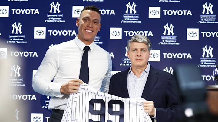 Dec 21, 2022; Bronx, New York, USA; Aaron Judge poses with Hal Steinbrenner during a press conference at Yankee Stadium. Mandatory Credit: Jessica Alcheh-USA TODAY Sports