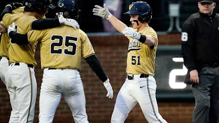 Vanderbilt shortstop Ryker Waite (51) celebrates his grand slam home run against Eastern Michigan during the second inning at Hawkins Field in Nashville, Tenn., Wednesday, Feb. 18, 2026.