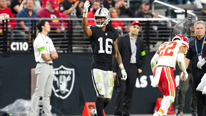 Nov 26, 2023; Paradise, Nevada, USA; Las Vegas Raiders wide receiver Jakobi Meyers (16) celebrates after making a play against the Kansas City Chiefs during the third quarter at Allegiant Stadium. Mandatory Credit: Stephen R. Sylvanie-Imagn Images