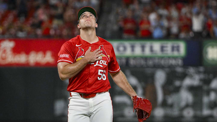Jul 25, 2025; St. Louis, Missouri, USA;  St. Louis Cardinals relief pitcher Ryan Helsley (56) reacts after the Cardinals defeated the San Diego Padres at Busch Stadium. Mandatory Credit: Jeff Curry-Imagn Images