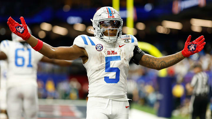 Jan 1, 2026; New Orleans, LA, USA; Mississippi Rebels running back Kewan Lacy (5) celebrates after scoring a touchdown against the Georgia Bulldogs in the third quarter during the 2025 Sugar Bowl and quarterfinal game of the College Football Playoff at Caesars Superdome. Mandatory Credit: Geoff Burke-Imagn Images