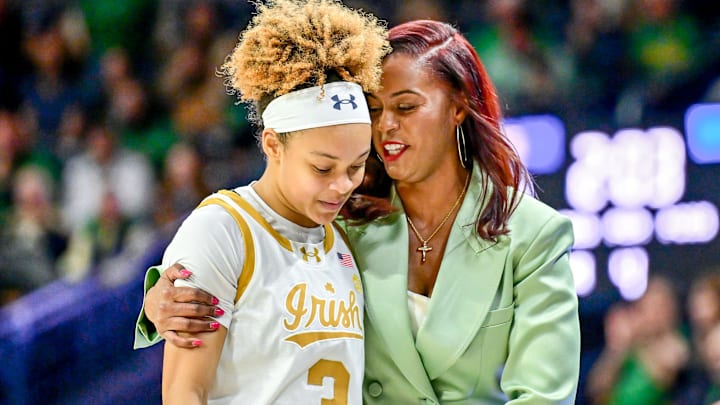 Feb 17, 2025; South Bend, Indiana, USA; Notre Dame Fighting Irish head coach Niele Ivey talks to guard Hannah Hidalgo (3) in the second half against the Duke Blue Devils at the Purcell Pavilion. 