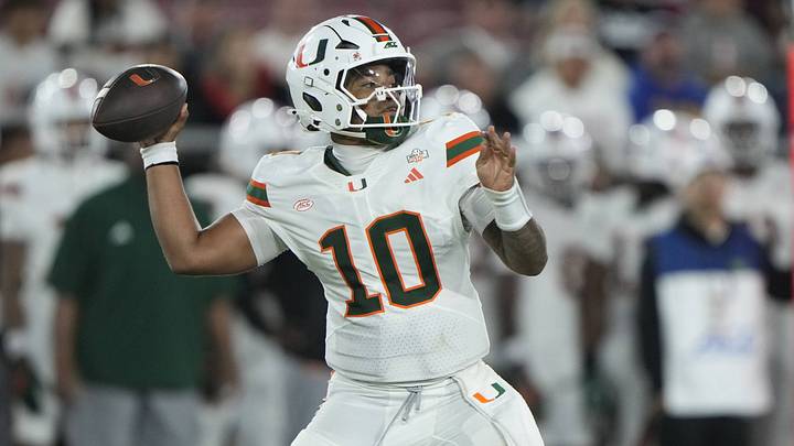 Sep 4, 2026; Stanford, California, USA; Miami Hurricanes quarterback Darian Mensah (10) stands in the pocket against the Stanford Cardinal during the third quarter at Stanford Stadium. Mandatory Credit: Stan Szeto-Imagn Images Sep 4, 2026; Stanford, California, USA; Miami Hurricanes quarterback Darian Mensah (10) stands in the pocket against the Stanford Cardinal during the third quarter at Stanford Stadium. Mandatory Credit: Stan Szeto-Imagn Images