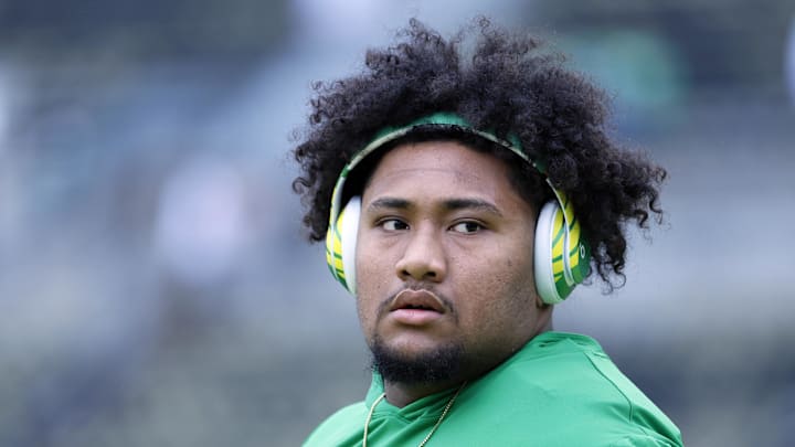 Oct 21, 2023; Eugene, Oregon, USA; Oregon Ducks offensive lineman Iapani Laloulu (72)  looks on during warm ups prior to the game against the Washington State Cougars at Autzen Stadium. 