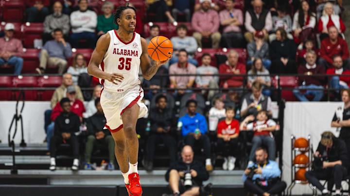 Dec 22, 2024; Tuscaloosa, Alabama, USA; Alabama Crimson Tide forward Derrion Reid (35) drives the ball down the court against the Kent State Golden Flashes during the second half at Coleman Coliseum. Mandatory Credit: Will McLelland-Imagn Images