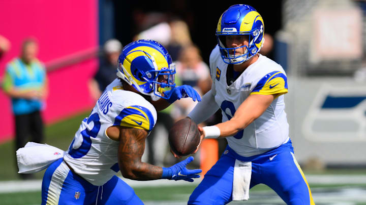 Sep 10, 2023; Seattle, Washington, USA; Los Angeles Rams quarterback Matthew Stafford (9) hands the ball off to running back Kyren Williams (23) during the first half against the Seattle Seahawks at Lumen Field.