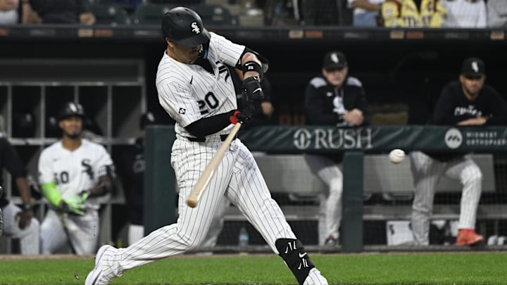 Aug 28, 2025; Chicago, Illinois, USA;  Chicago White Sox third baseman Miguel Vargas (20) hits a grand slam against the New York Yankees during the second inning at Rate Field. Mandatory Credit: Matt Marton-Imagn Images