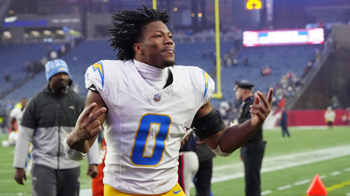 Dec 28, 2024; Foxborough, Massachusetts, USA; Los Angeles Chargers linebacker Daiyan Henley (0) celebrates after defeating the New England Patriots at Gillette Stadium. Mandatory Credit: Gregory Fisher-Imagn Images