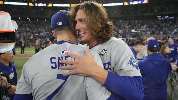 Oct 31, 2025; Toronto, Ontario, CAN; Los Angeles Dodgers pitcher Blake Snell (7) and pitcher Tyler Glasnow (31) celebrate after defeating the Toronto Blue Jays in the 2025 MLB World Series at Rogers Centre. Mandatory Credit: John E. Sokolowski-Imagn Images