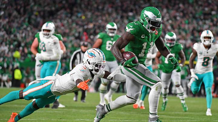 Philadelphia Eagles wide receiver A.J. Brown (11) scores a touchdown past Miami Dolphins cornerback Kader Kohou (4) during the third quarter at Lincoln Financial Field during a 2023 season. Philadelphia Eagles wide receiver A.J. Brown (11) scores a touchdown past Miami Dolphins cornerback Kader Kohou (4) during the third quarter at Lincoln Financial Field during a 2023 season.