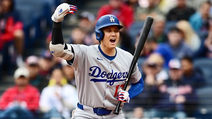 May 28, 2025; Cleveland, Ohio, USA; Los Angeles Dodgers designated hitter Shohei Ohtani (17) motions for Los Angeles Dodgers first baseman Kike Hernandez (not pictured) to come home on a wild pitch during the seventh inning against the Cleveland Guardians at Progressive Field.