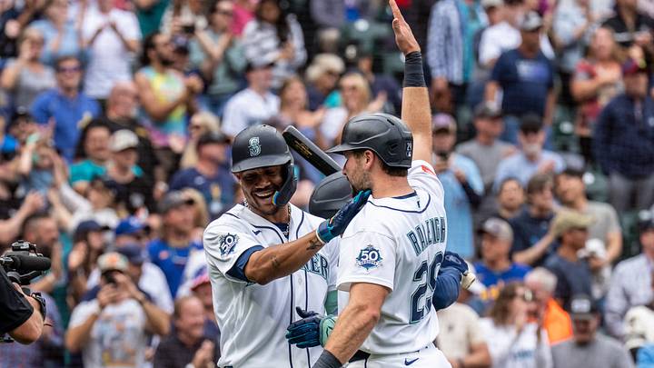 Sep 10, 2026; Seattle, Washington, USA; Seattle Mariners centerfielder Julio Rodriguez (44), left, celebrates with catcher Cal Raleigh (29) after hitting a three-run home run during the seventh inning against the Texas Rangers at T-Mobile Park. Mandatory Credit: Stephen Brashear-Imagn Images Sep 10, 2026; Seattle, Washington, USA; Seattle Mariners centerfielder Julio Rodriguez (44), left, celebrates with catcher Cal Raleigh (29) after hitting a three-run home run during the seventh inning against the Texas Rangers at T-Mobile Park. Mandatory Credit: Stephen Brashear-Imagn Images