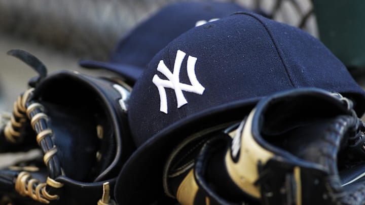 Jul 5, 2016; Chicago, IL, USA; New York Yankees caps and gloves sit in the dugout during the game against the Chicago White Sox at U.S. Cellular Field. Mandatory Credit: Caylor Arnold-Imagn Images Jul 5, 2016; Chicago, IL, USA; New York Yankees caps and gloves sit in the dugout during the game against the Chicago White Sox at U.S. Cellular Field. Mandatory Credit: Caylor Arnold-Imagn Images