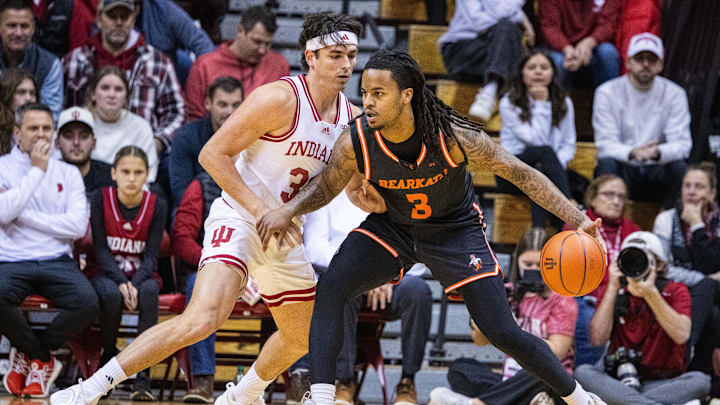 Dec 3, 2024; Bloomington, Indiana, USA; Sam Houston State Bearkats guard Lamar Wilkerson (3) dribbles the ball while Indiana Hoosiers guard Trey Galloway (32) defends in the first half at Simon Skjodt Assembly Hall. Mandatory Credit: Trevor Ruszkowski-Imagn Images Dec 3, 2024; Bloomington, Indiana, USA; Sam Houston State Bearkats guard Lamar Wilkerson (3) dribbles the ball while Indiana Hoosiers guard Trey Galloway (32) defends in the first half at Simon Skjodt Assembly Hall. Mandatory Credit: Trevor Ruszkowski-Imagn Images