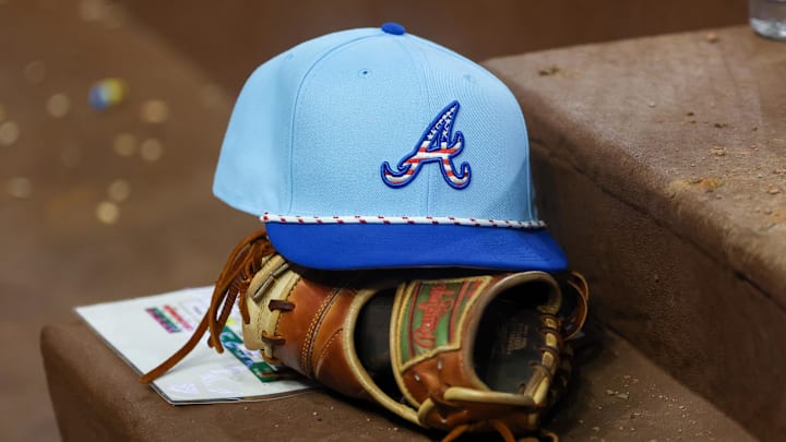Jul 4, 2025; Atlanta, Georgia, USA; A detailed view of the Atlanta Braves 4th of July hat in the dugout against the Baltimore Orioles in the seventh inning at Truist Park. Mandatory Credit: Brett Davis-Imagn Images
