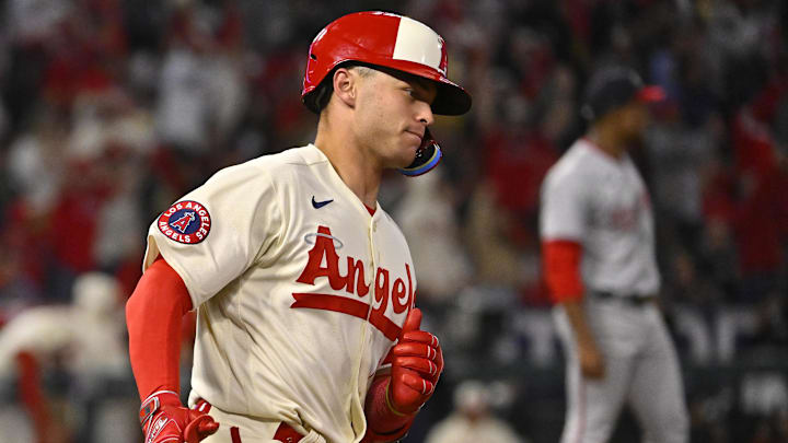Apr 11, 2023; Anaheim, California, USA; Los Angeles Angels catcher Logan O'Hoppe (14) heads to first