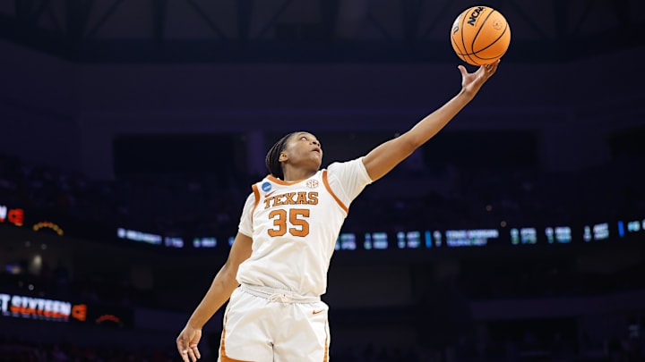 Mar 28, 2026; Fort Worth, TX, USA;  Texas Longhorns forward Madison Booker (35) grabs a rebound against the Kentucky Wildcats during the first half at Dickies Arena.