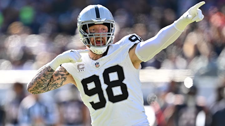 Oct 22, 2023; Chicago, Illinois, USA;  Las Vegas Raiders defensive end Maxx Crosby (98) reacts after the Chicago Bears jumped the snap in the third quarter at Soldier Field. Mandatory Credit: Jamie Sabau-Imagn Images