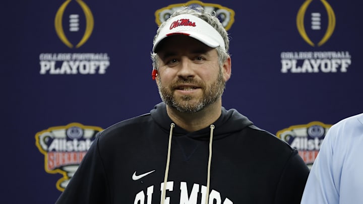 Ole Miss Rebels head coach Pete Golding smiles from the stage after defeating the Georgia Bulldogs during the 2026 Sugar Bowl and quarterfinal game of the College Football Playoff at Caesars Superdome. Ole Miss Rebels head coach Pete Golding smiles from the stage after defeating the Georgia Bulldogs during the 2026 Sugar Bowl and quarterfinal game of the College Football Playoff at Caesars Superdome.