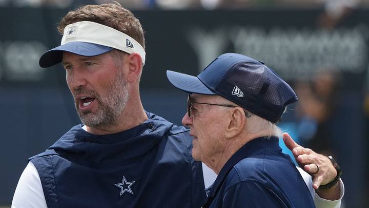 Dallas Cowboys coach Brian Schottenheimer and owner Jerry Jones at training camp at River Ridge Playing Fields. Dallas Cowboys coach Brian Schottenheimer and owner Jerry Jones at training camp at River Ridge Playing Fields.