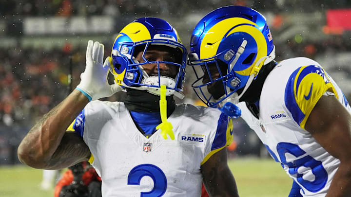 Jan 18, 2026; Chicago, IL, USA; Los Angeles Rams safety Kam Curl (3) acknowledges the crowd with safety Kamren Kinchens (26) after intercepting a pass intended for Chicago Bears wide receiver DJ Moore (not pictured) during overtime of an NFC Divisional Round game at Soldier Field. Mandatory Credit: David Banks-Imagn Images Jan 18, 2026; Chicago, IL, USA; Los Angeles Rams safety Kam Curl (3) acknowledges the crowd with safety Kamren Kinchens (26) after intercepting a pass intended for Chicago Bears wide receiver DJ Moore (not pictured) during overtime of an NFC Divisional Round game at Soldier Field. Mandatory Credit: David Banks-Imagn Images