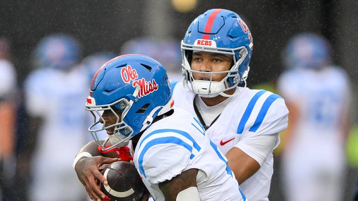 Ole Miss Rebels quarterback Trinidad Chambliss (6) hands the ball off to running back Kewan Lacy (5) against the Vanderbilt Commodores during pre-game warmups at FirstBank Stadium. Ole Miss Rebels quarterback Trinidad Chambliss (6) hands the ball off to running back Kewan Lacy (5) against the Vanderbilt Commodores during pre-game warmups at FirstBank Stadium.