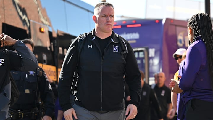 Oct 29, 2022; Iowa City, Iowa, USA; Northwestern Wildcats head coach Pat Fitzgerald enters Kinnick Stadium before the game against the Iowa Hawkeyes. Mandatory Credit: Jeffrey Becker-Imagn Images