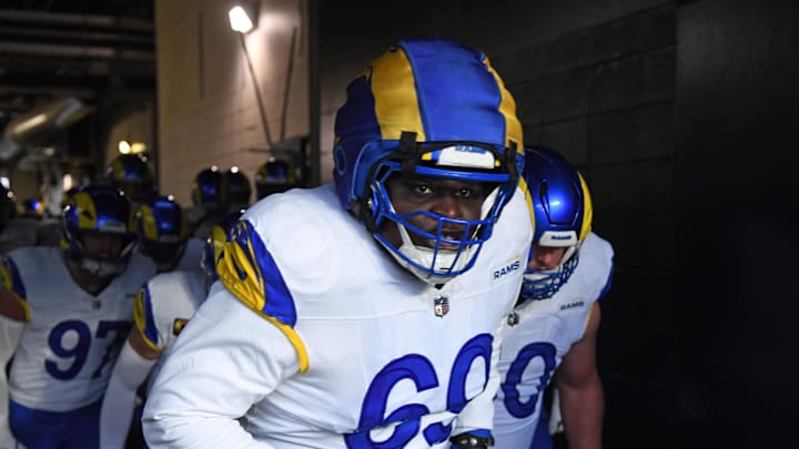 Jan 19, 2025; Philadelphia, Pennsylvania, USA; Los Angeles Rams guard Kevin Dotson (69) walks to the field against the Philadelphia Eagles in a 2025 NFC divisional round game at Lincoln Financial Field. Mandatory Credit: Eric Hartline-Imagn Images Jan 19, 2025; Philadelphia, Pennsylvania, USA; Los Angeles Rams guard Kevin Dotson (69) walks to the field against the Philadelphia Eagles in a 2025 NFC divisional round game at Lincoln Financial Field. Mandatory Credit: Eric Hartline-Imagn Images