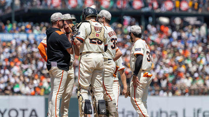 May 18, 2025; San Francisco, California, USA; San Francisco Giants pitcher Justin Verlander (35) has a conference at the mound during the fourth inning against the Oakland Athletics at Oracle Park. 