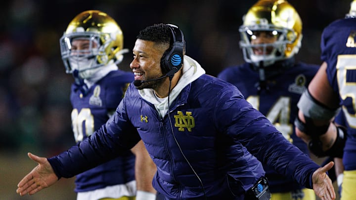 Notre Dame head coach Marcus Freeman celebrates a touchdown scored during the first round of the College Football Playoff between Notre Dame and Indiana University at Notre Dame Stadium on Friday, Dec. 20, 2024, in South Bend. Notre Dame head coach Marcus Freeman celebrates a touchdown scored during the first round of the College Football Playoff between Notre Dame and Indiana University at Notre Dame Stadium on Friday, Dec. 20, 2024, in South Bend.