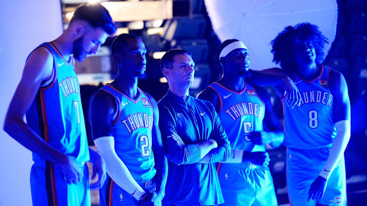 Chet Holmgren, Shai Gilgeous-Alexander, Head Coach Mark Daigneault, Luguentz Dort and Jalen Williams pose for promo photos.Thunder media day ay the Paycom Center Monday, Sept. 30, 2024.