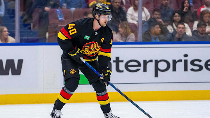 Dec 21, 2024; Vancouver, British Columbia, CAN; Vancouver Canucks forward Elias Pettersson (40) handles the puck against the Ottawa Senators during the first period at Rogers Arena. Mandatory Credit: Bob Frid-Imagn Images Dec 21, 2024; Vancouver, British Columbia, CAN; Vancouver Canucks forward Elias Pettersson (40) handles the puck against the Ottawa Senators during the first period at Rogers Arena. Mandatory Credit: Bob Frid-Imagn Images