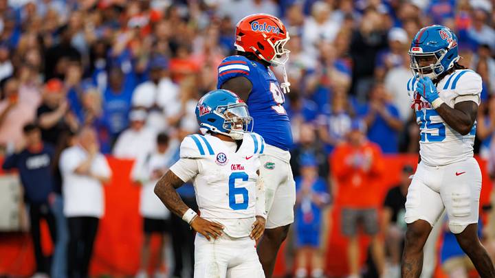 Mississippi Rebels quarterback Trinidad Chambliss winces from the ground Mississippi Rebels quarterback Trinidad Chambliss winces from the ground