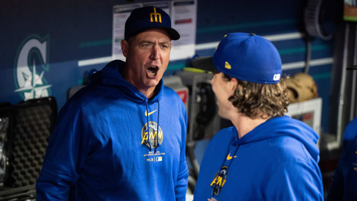 Seattle Mariners manager Dan Wilson (left) yells to starting pitcher Logan Gilbert during a game against the San Francisco Giants on Friday at T-Mobile Park. Seattle Mariners manager Dan Wilson (left) yells to starting pitcher Logan Gilbert during a game against the San Francisco Giants on Friday at T-Mobile Park.
