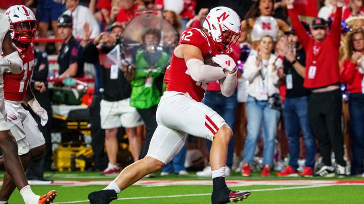 Third-string linebacker Derek Wacker scores a fourth-quarter touchdown on a fumble return. Third-string linebacker Derek Wacker scores a fourth-quarter touchdown on a fumble return.
