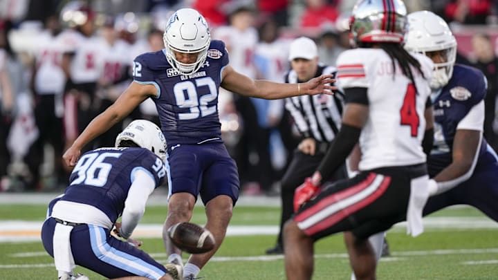 Old Dominion Monarchs place kicker Ethan Sanchez (92) adds an extra point against the Western Kentucky Hilltoppers during the second half at Charlotte 49ers' Jerry Richardson Stadium. Old Dominion Monarchs place kicker Ethan Sanchez (92) adds an extra point against the Western Kentucky Hilltoppers during the second half at Charlotte 49ers' Jerry Richardson Stadium.