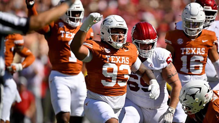 Texas Longhorns defensive tackle Hero Kanu celebrates during the game between the Texas Longhorns and the Oklahoma Sooners at the Cotton Bowl.