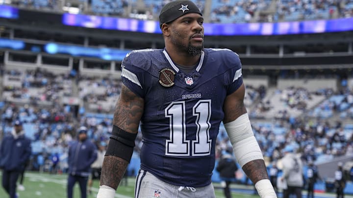 Dec 15, 2024; Charlotte, North Carolina, USA; Dallas Cowboys linebacker Micah Parsons (11) walks onto the field during the first quarter against the Carolina Panthers at Bank of America Stadium. Mandatory Credit: Jim Dedmon-Imagn Images