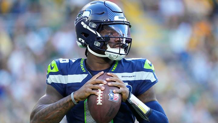 Seattle Seahawks quarterback Jalen Milroe warms up near the sidelines during the game against the Green Bay Packers. Seattle Seahawks quarterback Jalen Milroe warms up near the sidelines during the game against the Green Bay Packers.