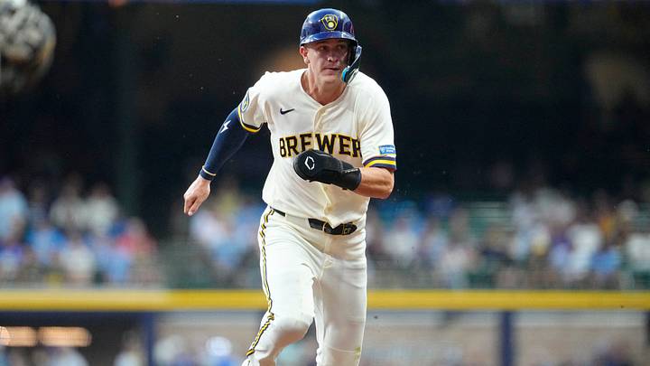 Aug 4, 2026; Milwaukee, Wisconsin, USA; Milwaukee Brewers right fielder Cooper Pratt (12) scores from second base against the Pittsburgh Pirates in the fourth inning at American Family Field. Mandatory Credit: Michael McLoone-Imagn Images
