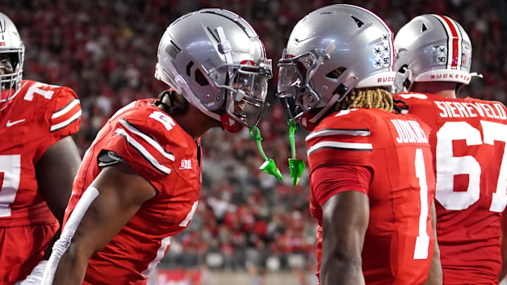 Wide receiver Emeka Egbuka #2 and running back Quinshon Judkins #1 of the Ohio State Buckeyes celebrate a touchdown during the game against the Western Michigan Broncos at Ohio Stadium on September 07, 2024 in Columbus, Ohio.