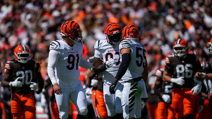 Cincinnati Bengals defensive end Trey Hendrickson (91), defensive end Shemar Stewart (97) and linebacker Logan Wilson (55) talk before coming off the field on fourth down in the second quarter of the NFL Week 1 game between the Cleveland Browns and the Cincinnati Bengals at Huntington Bank Field in Cleveland on Sunday, Sept. 7, 2025.
