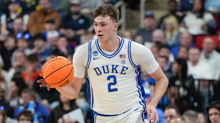 Mar 21, 2025; Raleigh, NC, USA; Duke Blue Devils forward Cooper Flagg (2) dribbles the ball against the Mount St. Mary's Mountaineers during the first half in the first round of the NCAA Tournament at Lenovo Center. Mandatory Credit: Bob Donnan-Imagn Images