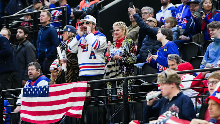 Feb 20, 2026; Milan, Italy; United States fans cheer during the third period against Slovakia in a men's ice hockey semifinal during the Milano Cortina 2026 Olympic Winter Games at Milano Santagiulia Ice Hockey Arena. Mandatory Credit: James Lang-Imagn Images Feb 20, 2026; Milan, Italy; United States fans cheer during the third period against Slovakia in a men's ice hockey semifinal during the Milano Cortina 2026 Olympic Winter Games at Milano Santagiulia Ice Hockey Arena. Mandatory Credit: James Lang-Imagn Images