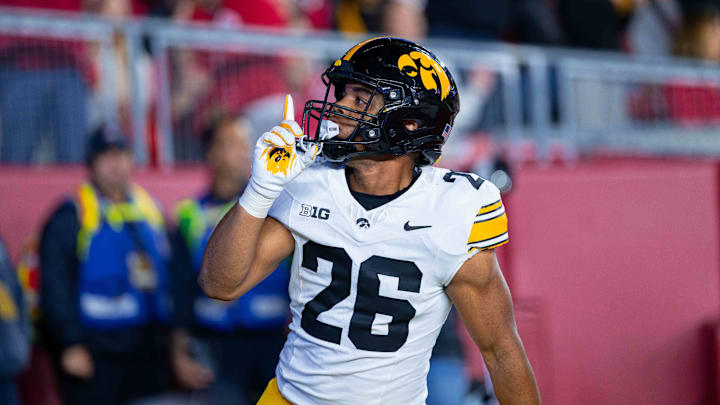 Oct 11, 2025; Madison, Wisconsin, USA; Iowa Hawkeyes running back Xavier Williams (26) celebrates a touchdown in the second half against the Wisconsin Badgers at Camp Randall Stadium. Mandatory Credit: Ross Harried-Imagn Images