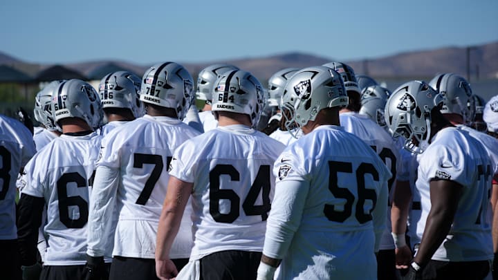 Jul 24, 2025; Henderson, NV, USA; Las Vegas Raiders players huddle during training camp at the Intermountain Healthcare Performance Center. Mandatory Credit: Kirby Lee-Imagn Images