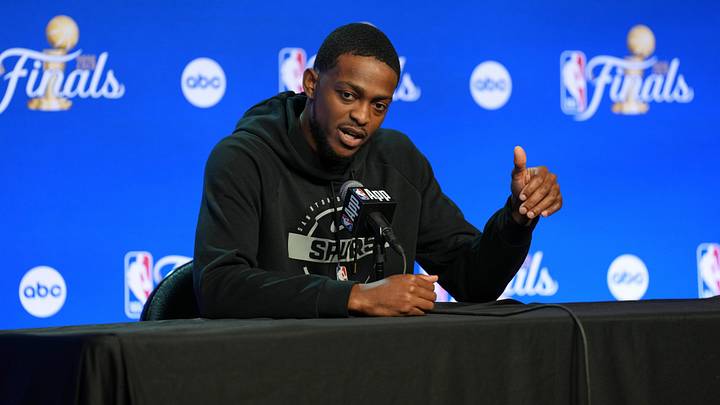 Jun 2, 2026; San Antonio, TX, USA;  San Antonio Spurs guard De'aaron Fox (4) talks to the press during media day for the 2026 NBA Finals at Frost Bank Center. Mandatory Credit: Daniel Dunn-Imagn Images