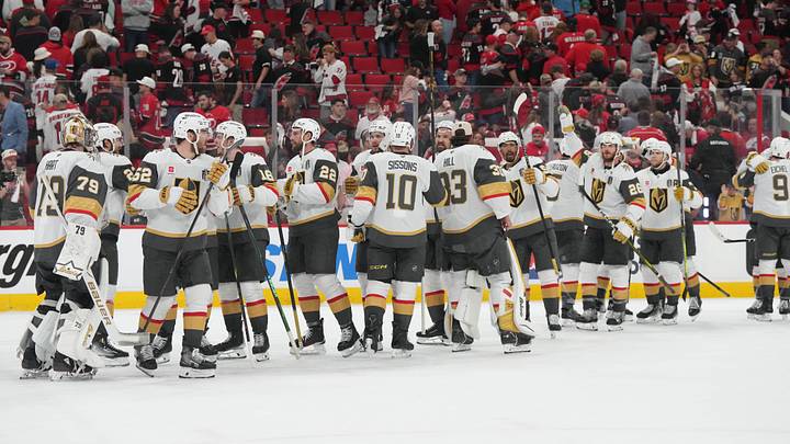 Jun 2, 2026; Raleigh, North Carolina, USA; Vegas Golden Knights celebrate the wing after the third period against the Carolina Hurricanes in game one of the 2026 Stanley Cup Final at Lenovo Center. Mandatory Credit: James Guillory-Imagn Images