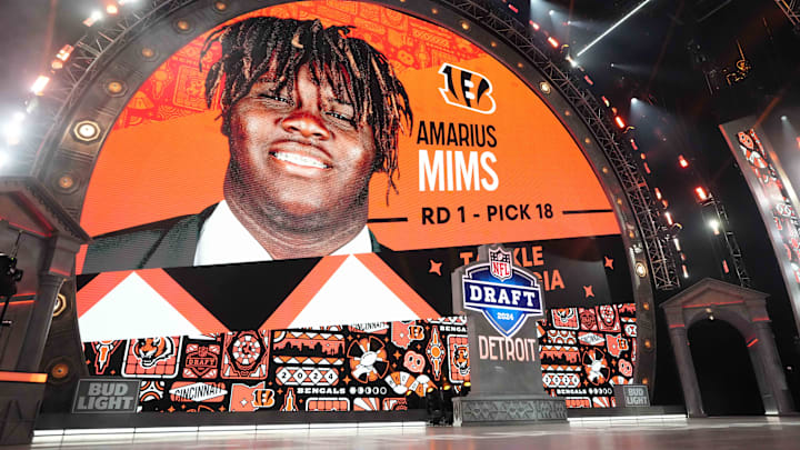 Apr 25, 2024; Detroit, MI, USA;  Georgia Bulldogs tackle Amarius Mims is selected as the No. 18 pick of the first round by the Cincinnati Bengals during the 2024 NFL Draft at Campus Martius Park and Hart Plaza. Mandatory Credit: Kirby Lee-Imagn Images